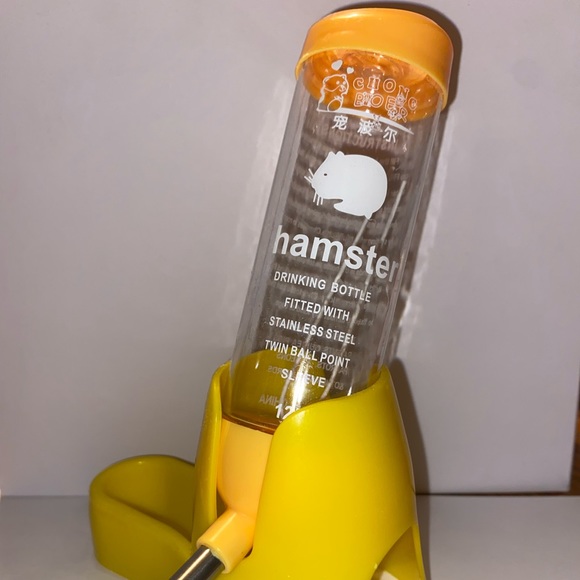 A yellow 3-In-1, (water bottle, feeding dish, and small hideout). - Picture 2 of 2